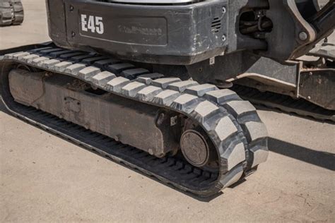 how to put rubber track back on mini excavator|bobcat mini excavator track replacement.